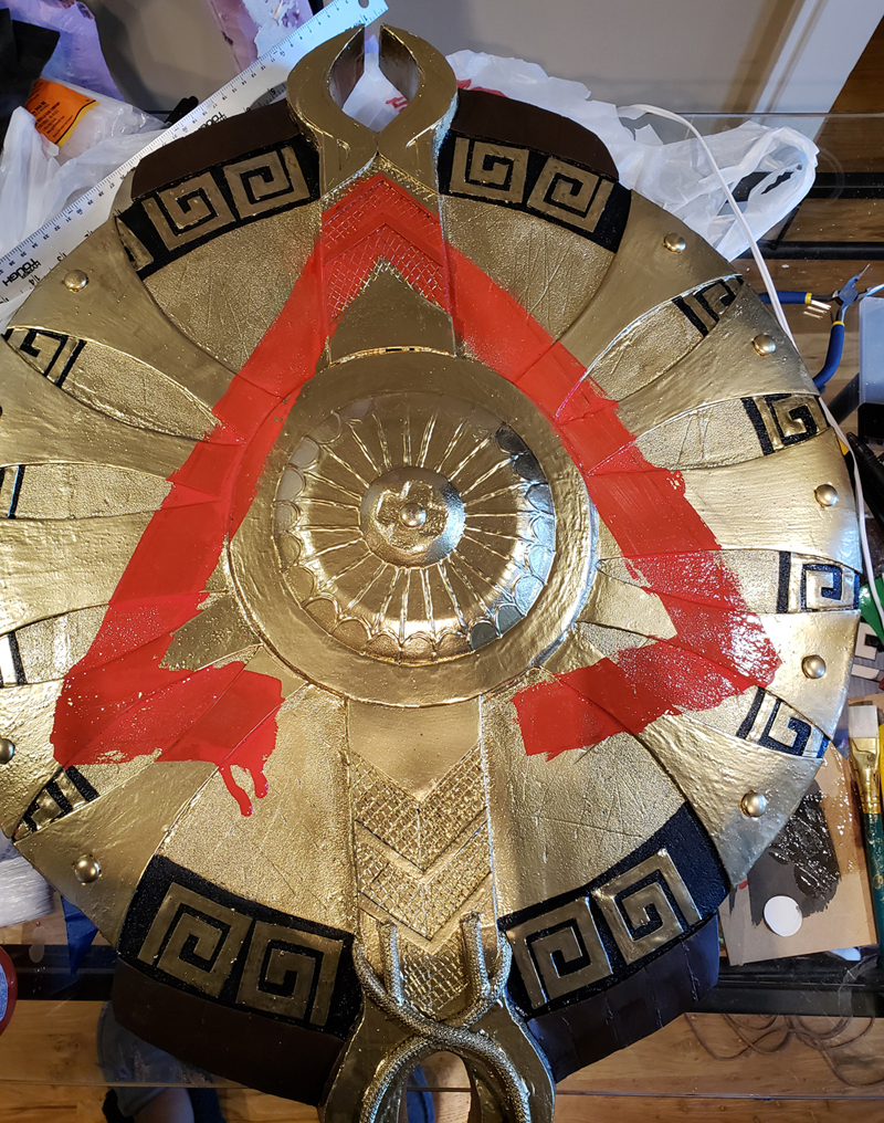 THE FINISHED SHIELD IS DISPLAYED HERE WITH ALL DETAILS ADHERED, ALL COATS COATED, AND FINISHING TOUCHES OF PAINT 