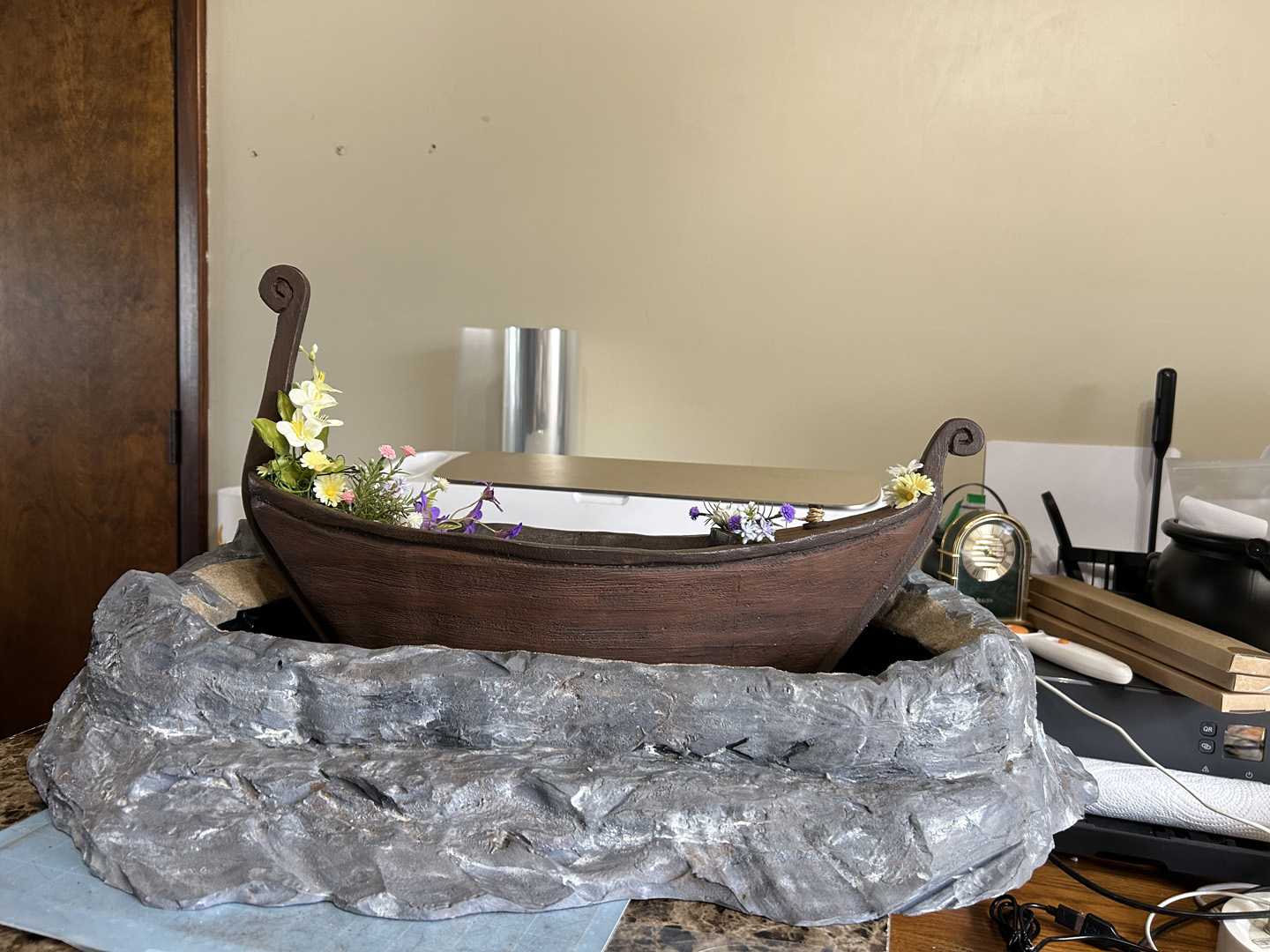 a small decorative boat table centerpiece