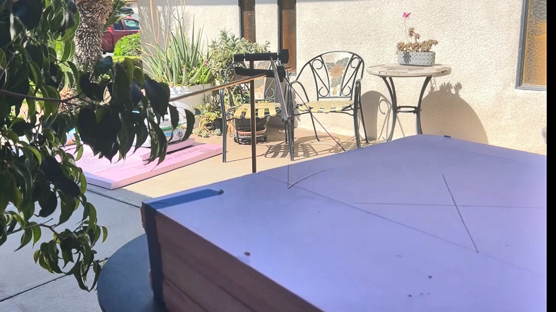 cutting a mini replica of rapunzel's tower out of pink xps foam