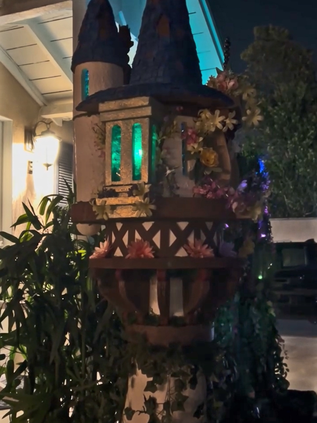 a mini replica of rapunzel's tower with LED lighting effects