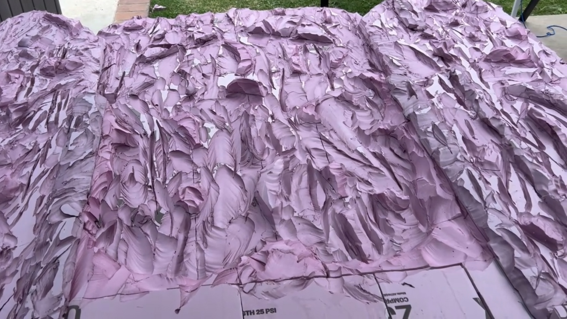 cutting a faux stone backdrop out of pink xps foam