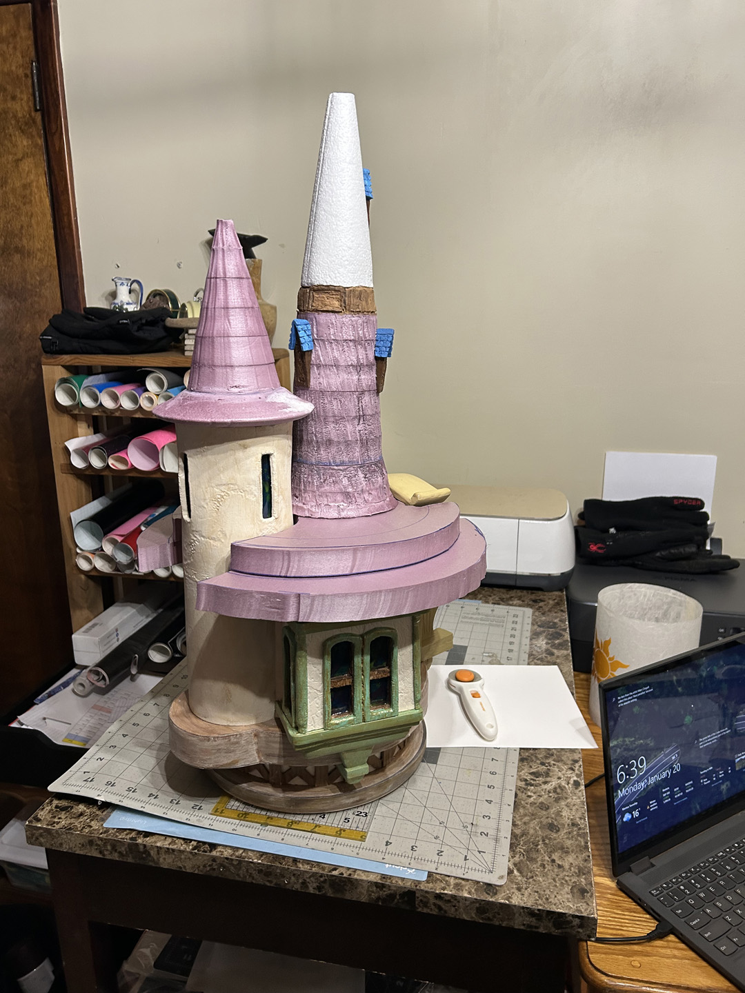 a mini replica of rapunzel's tower made out of pink xps foam
